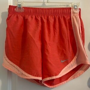 Nike Dri fit tempo shorts.  Peachy color.  Size Small